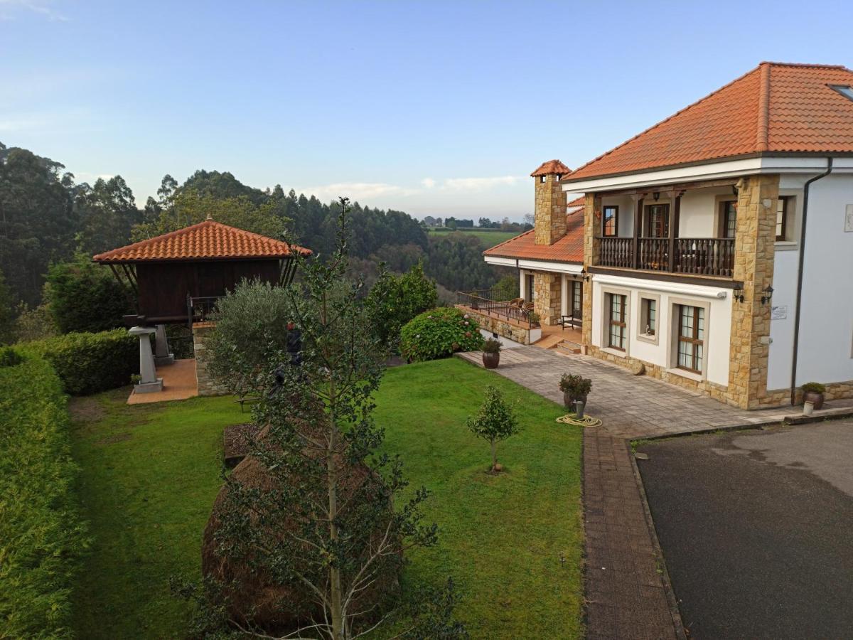 Somonte Hotel Quintes Bagian luar foto