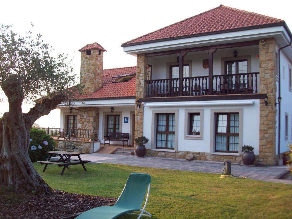 Somonte Hotel Quintes Bagian luar foto